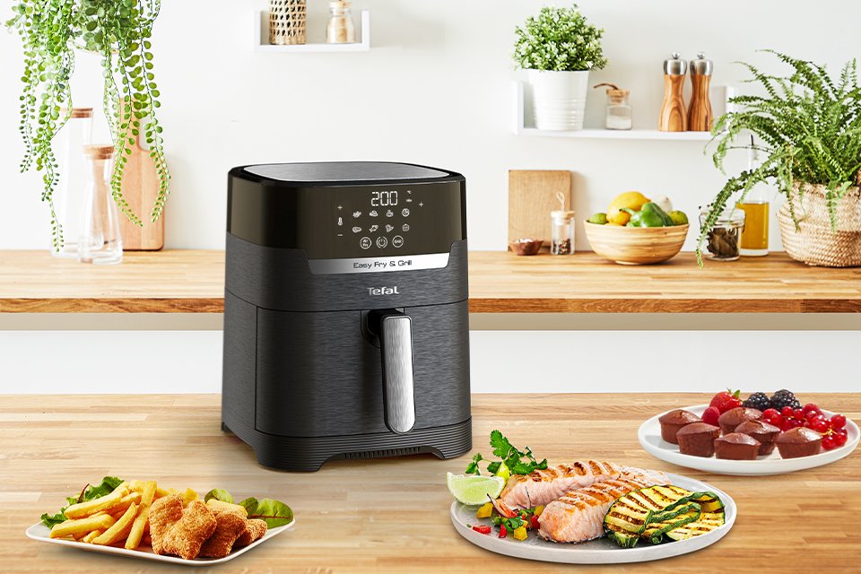 An air fryer sitting on a kitchen counter.